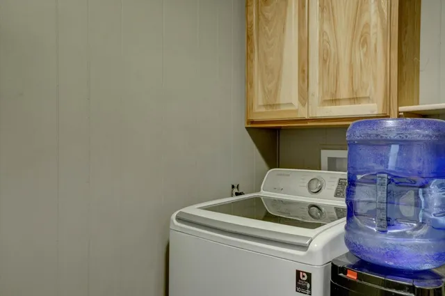 a view of street with parked cars