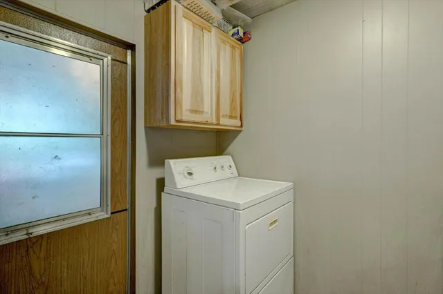 a view of street with parked cars