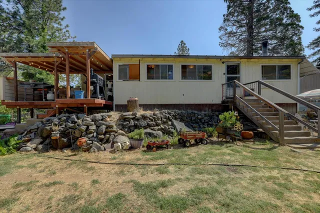 a view of road with large trees