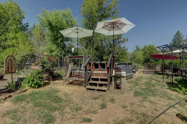 a view of backyard with green space