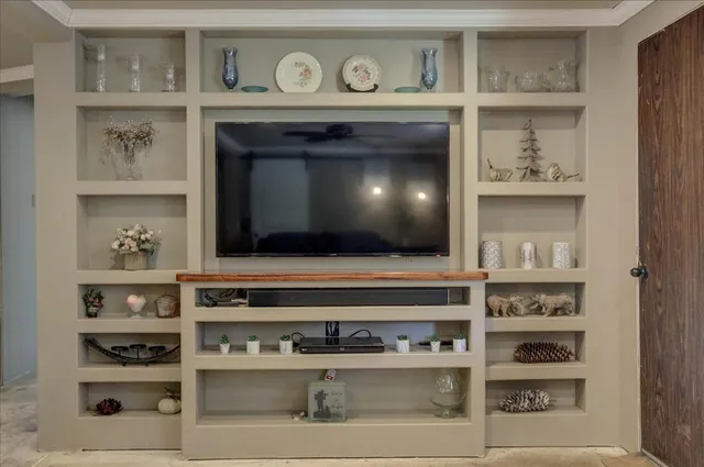 a kitchen with a sink stove and microwave