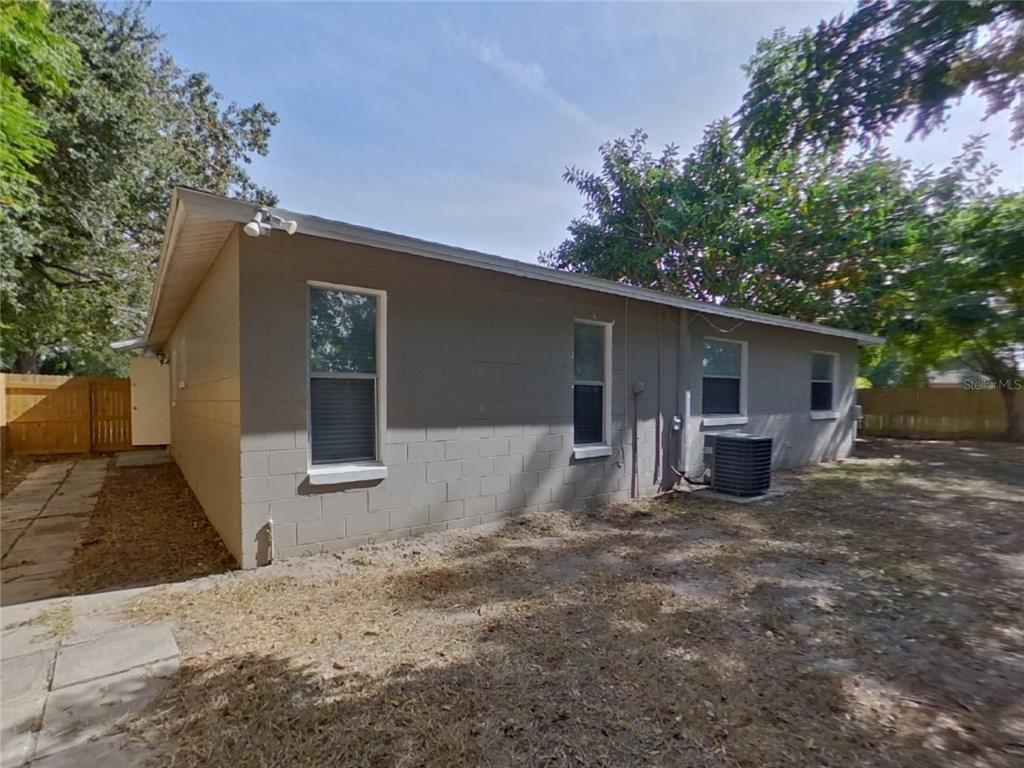 Undisclosed Address Seffner, FL 33584 - Photo 15 of 16 a view of a house with backyard and sitting area