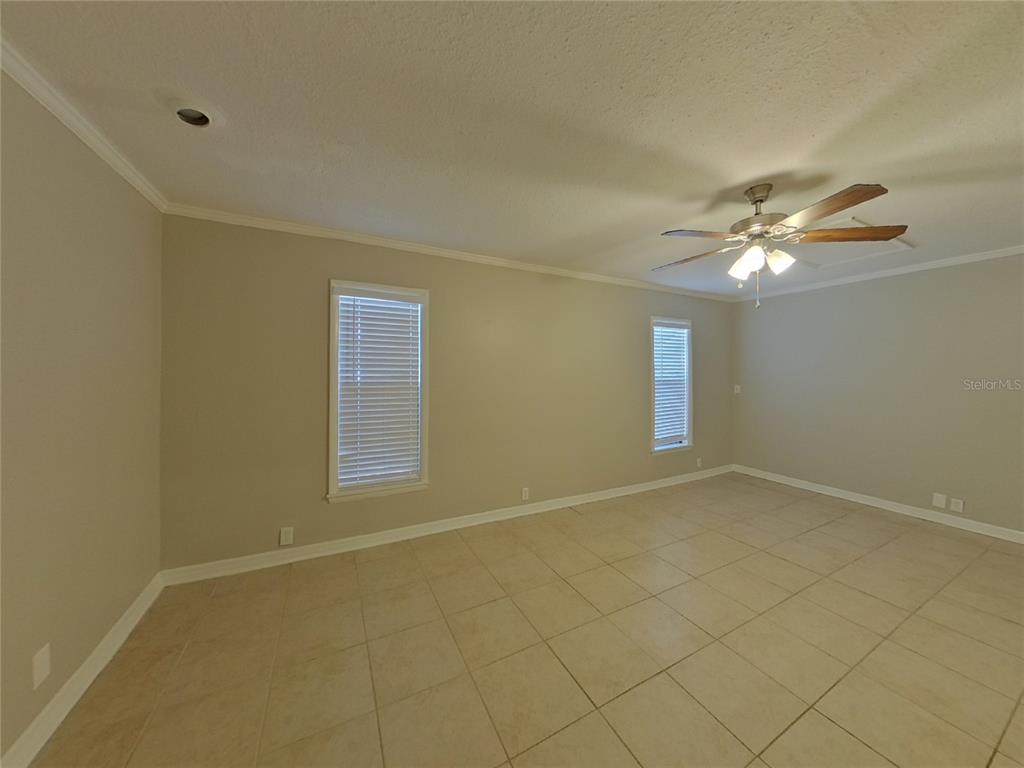 Undisclosed Address Seffner, FL 33584 - Photo 2 of 16 a view of an empty room with a window