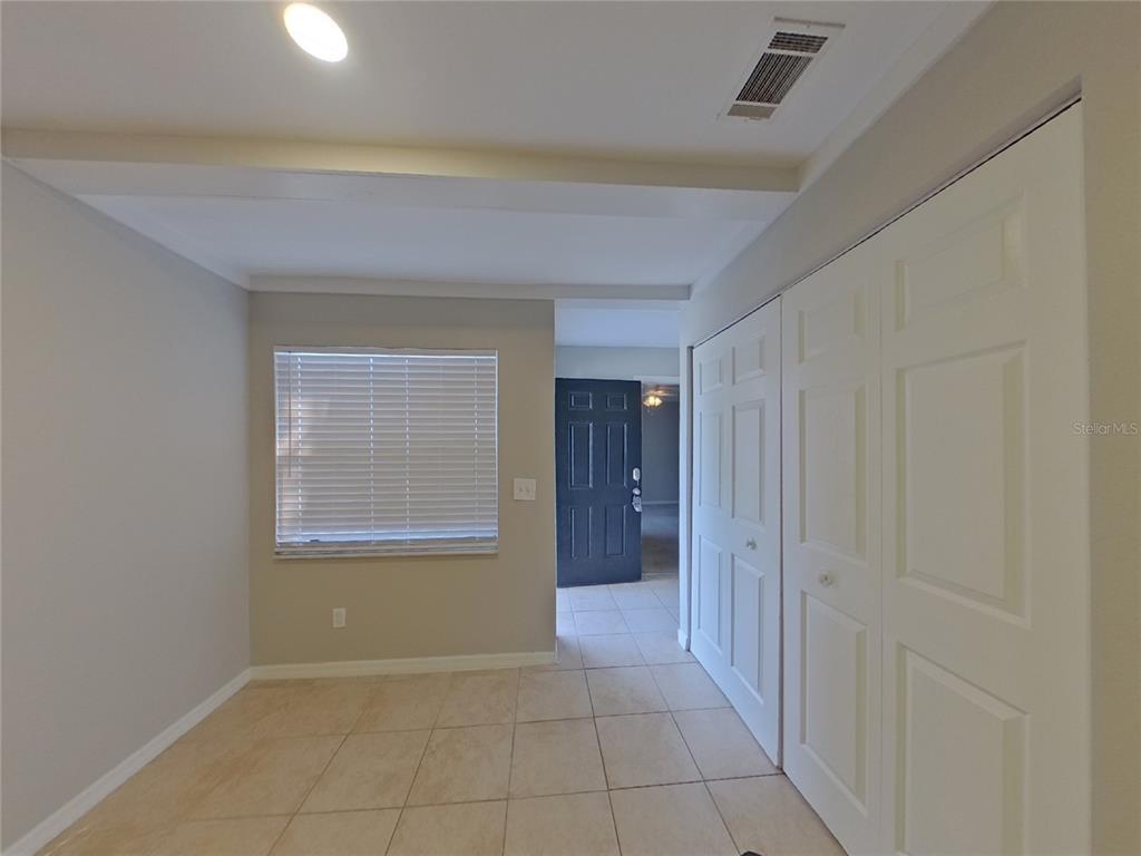 Undisclosed Address Seffner, FL 33584 - Photo 4 of 16 a view of an empty room and a window