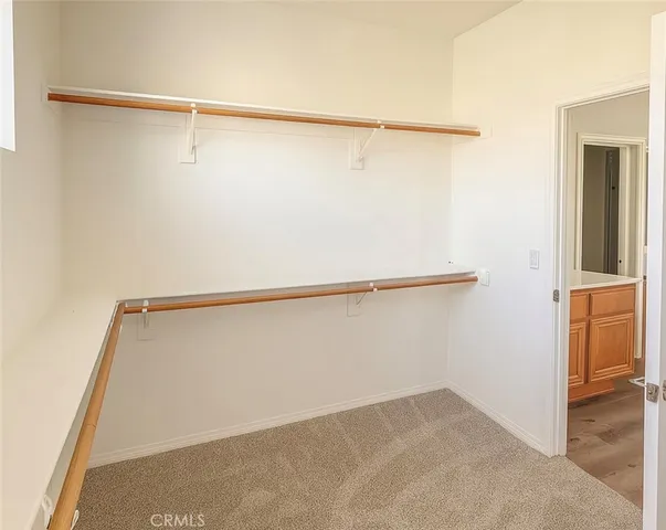 a view of a room with racks on the wall