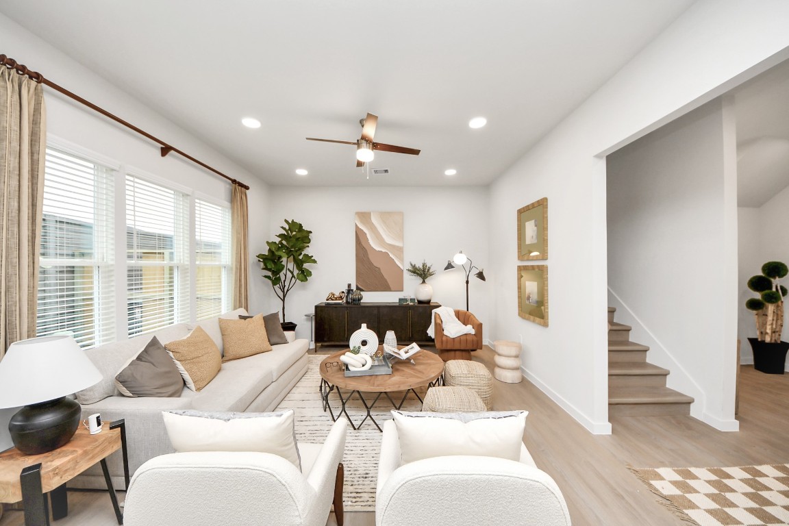 7306 Corey Rushing Lane Richmond, TX 77407 - Photo 11 of 50 a living room with furniture and wooden floor