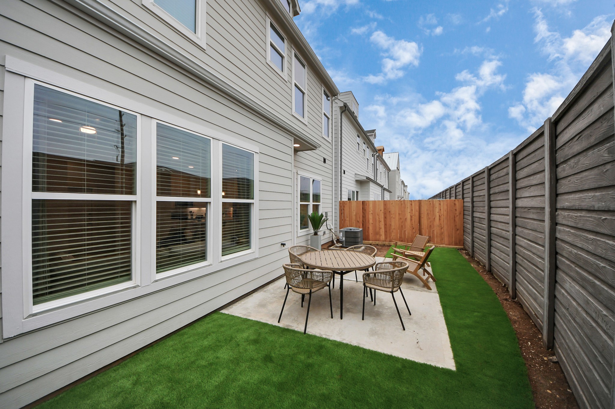 7306 Corey Rushing Lane Richmond, TX 77407 - Photo 2 of 50 a view of a house with backyard and a sitting area