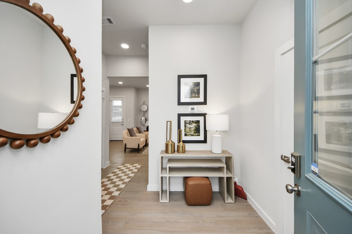 7306 Corey Rushing Lane Richmond, TX 77407 - Photo 13 of 50 a view of a hallway with seating area