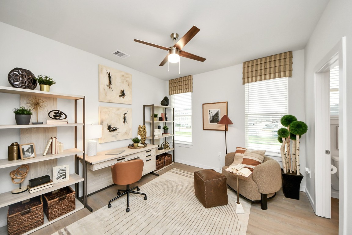 7306 Corey Rushing Lane Richmond, TX 77407 - Photo 20 of 50 a living room with furniture and a window