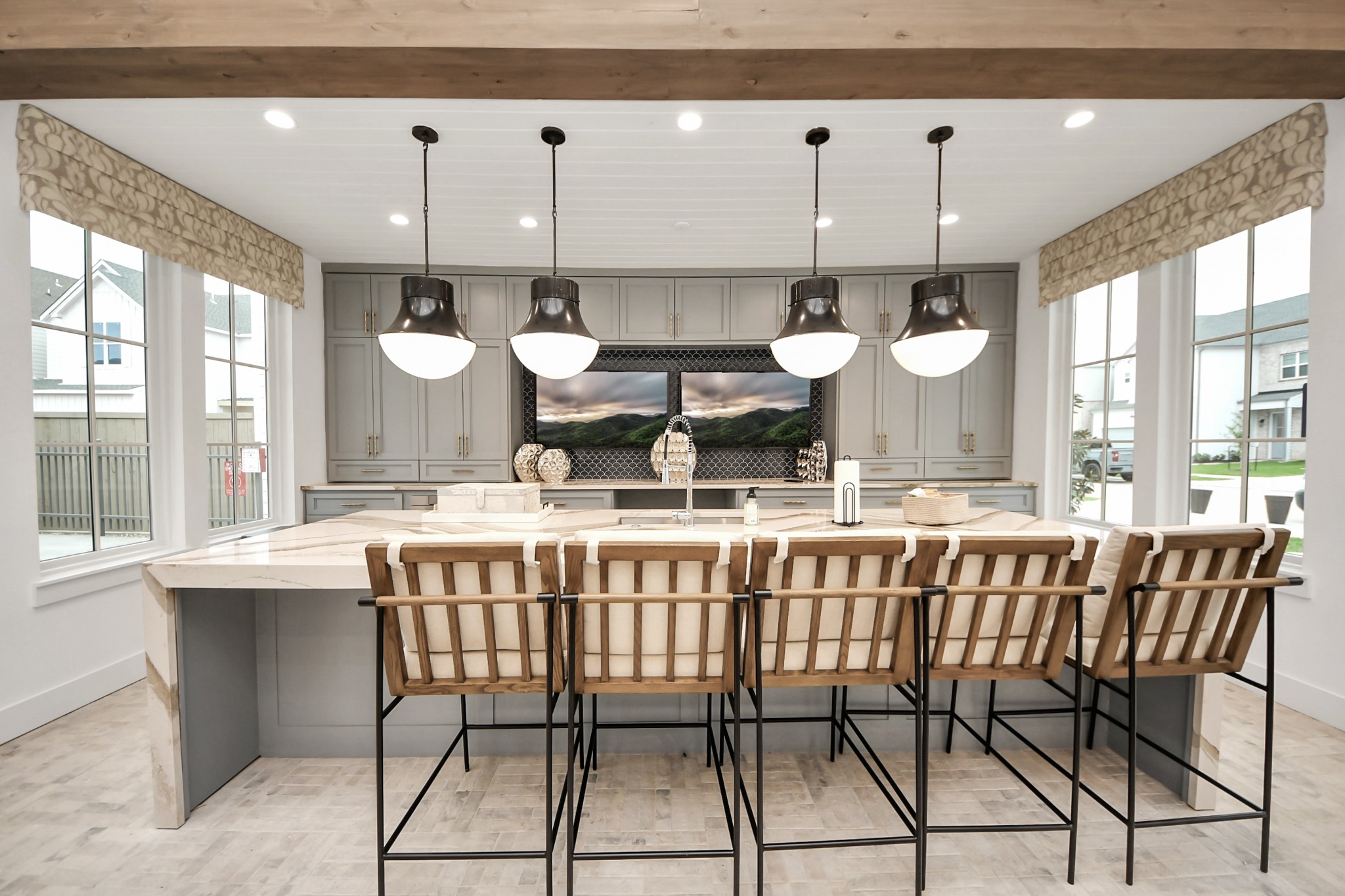 7306 Corey Rushing Lane Richmond, TX 77407 - Photo 40 of 50 a large kitchen with a table and chairs