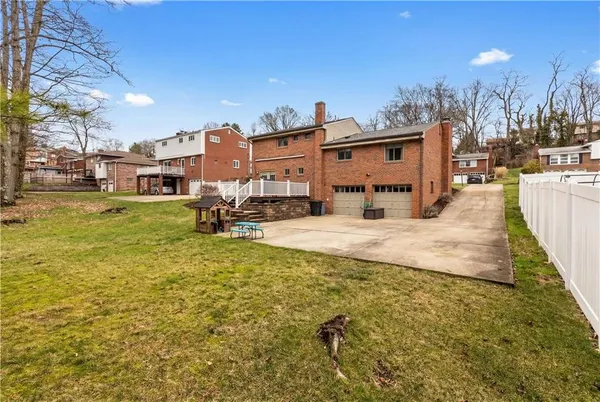an aerial view of a house with swimming pool