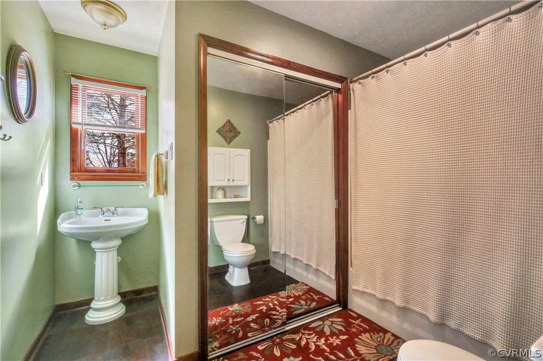 701 Clement Town Road Powhatan, VA 23139 - Photo 23 of 38 Full Bath With Mirrored Doors To The Laundry Area