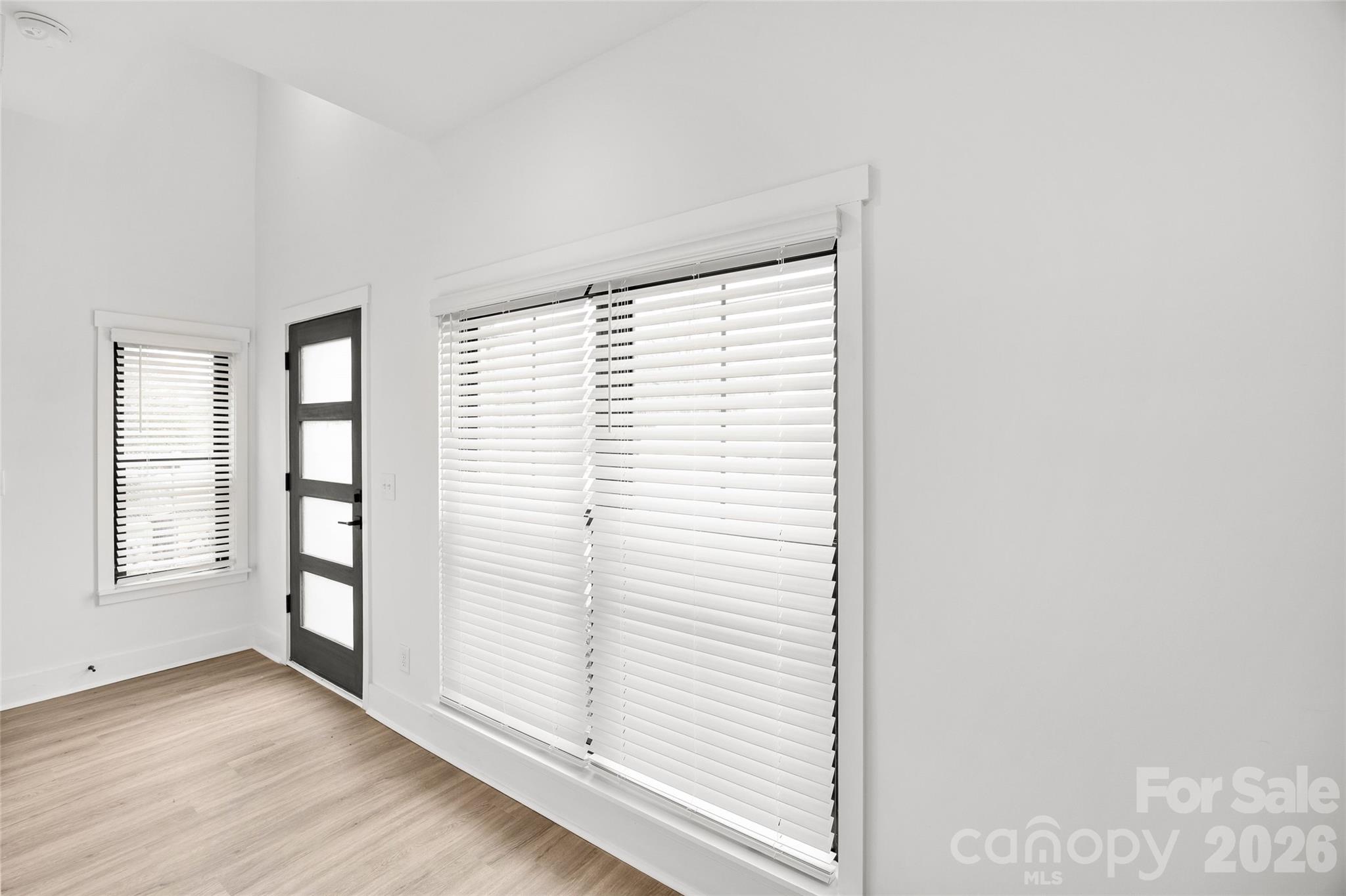 4041 South Tryon Street Charlotte, NC 28217 - Photo 11 of 45 an empty room with windows
