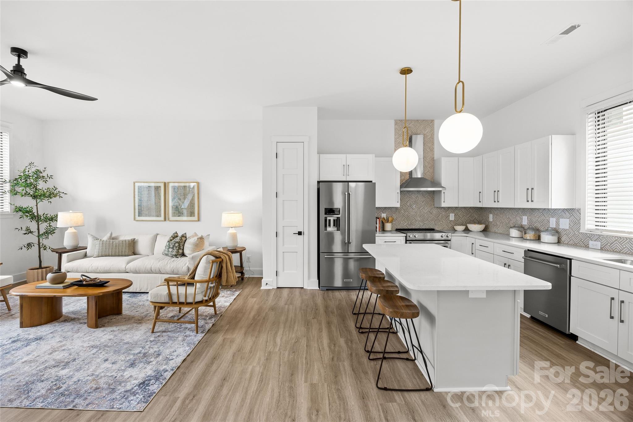 4041 South Tryon Street Charlotte, NC 28217 - Photo 12 of 45 a large kitchen with a table and chairs