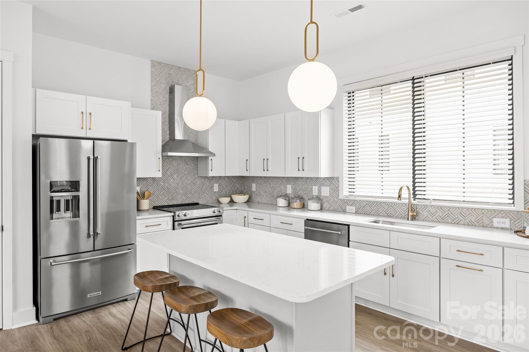 4041 South Tryon Street Charlotte, NC 28217 - Photo 16 of 45 a kitchen with appliances a sink and a window