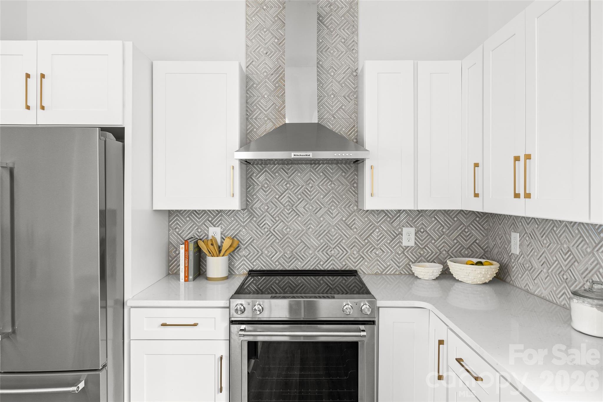 4041 South Tryon Street Charlotte, NC 28217 - Photo 19 of 45 a kitchen with a stove and cabinets