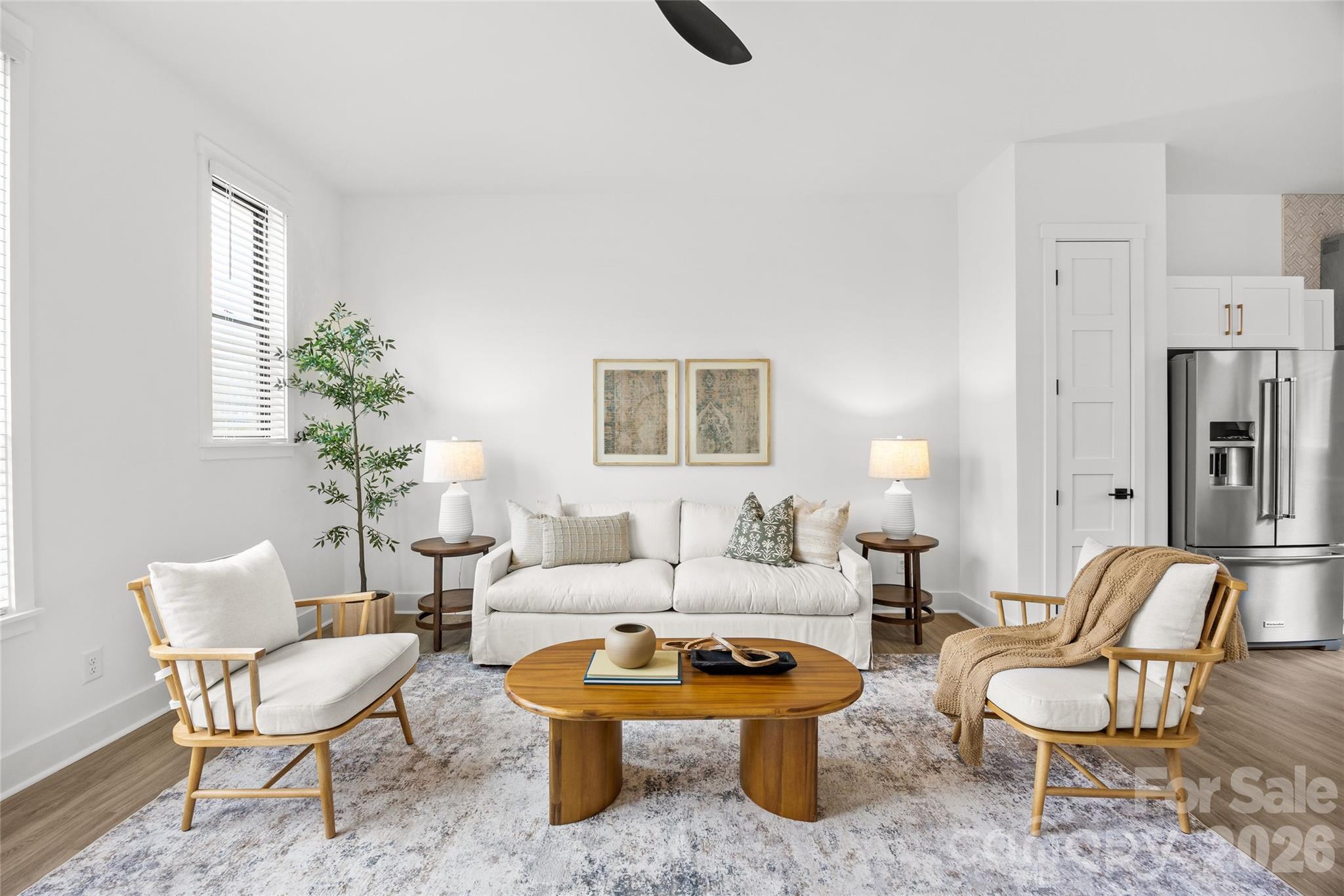 4041 South Tryon Street Charlotte, NC 28217 - Photo 26 of 45 a living room with furniture and a potted plant