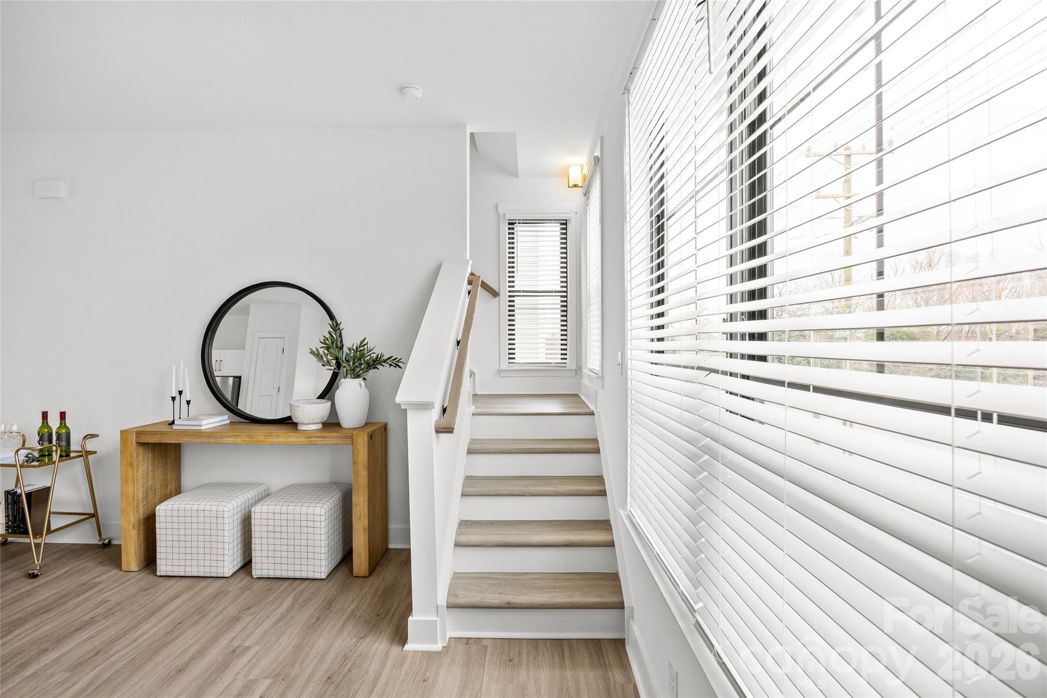 4041 South Tryon Street Charlotte, NC 28217 - Photo 29 of 45 a view of a room with wooden floor and a large window