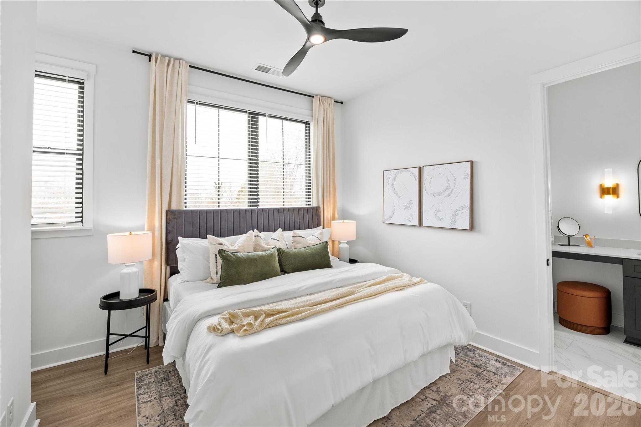 4041 South Tryon Street Charlotte, NC 28217 - Photo 31 of 45 a bedroom with a bed and a window
