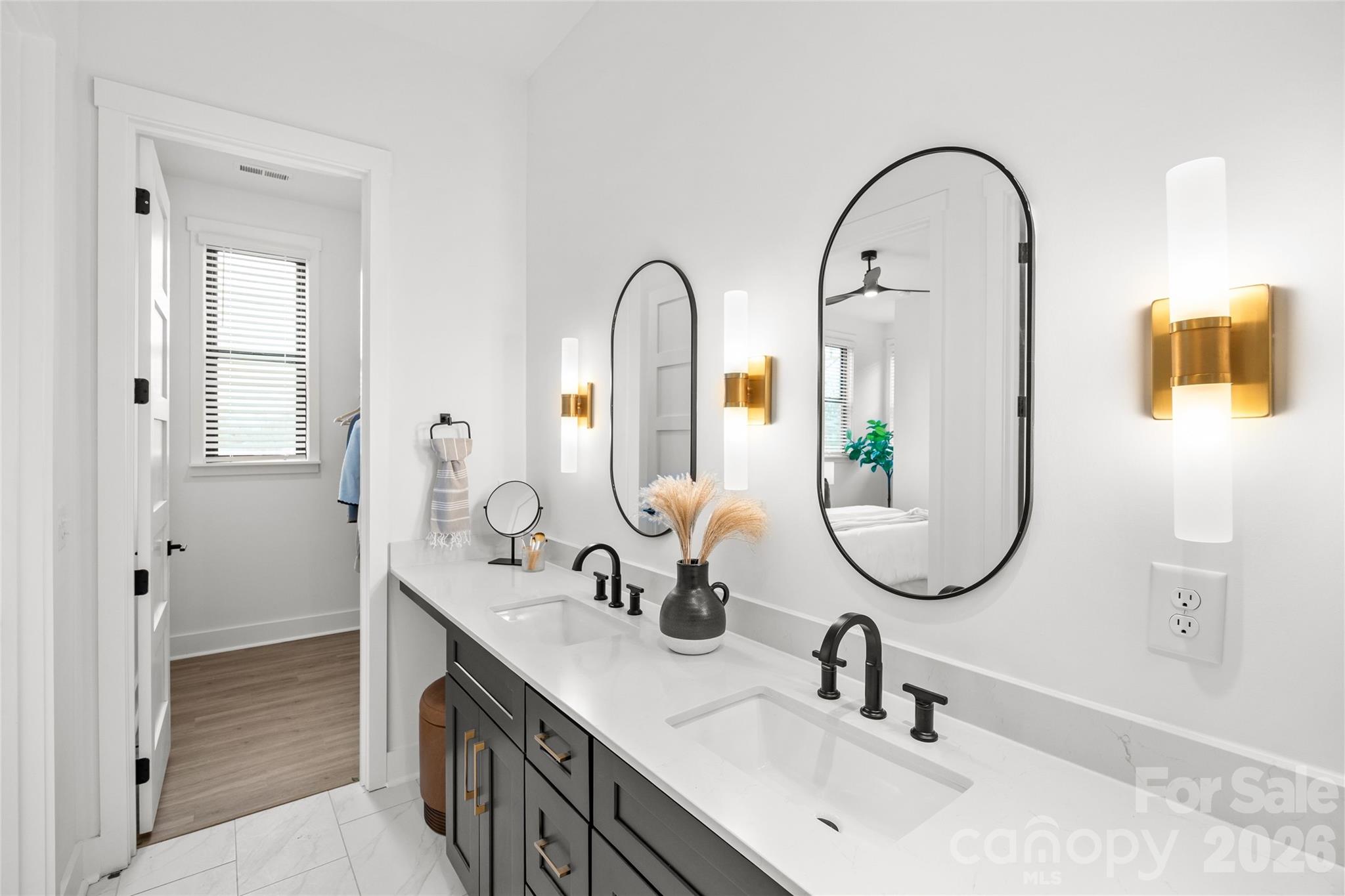 4041 South Tryon Street Charlotte, NC 28217 - Photo 37 of 45 a bathroom with a sink and a mirror
