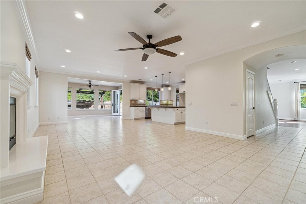 26511 Brooks Circle Stevenson Ranch, CA 91381 - Photo 18 of 65 a view of a electric appliances in kitchen and an empty room with wooden floor