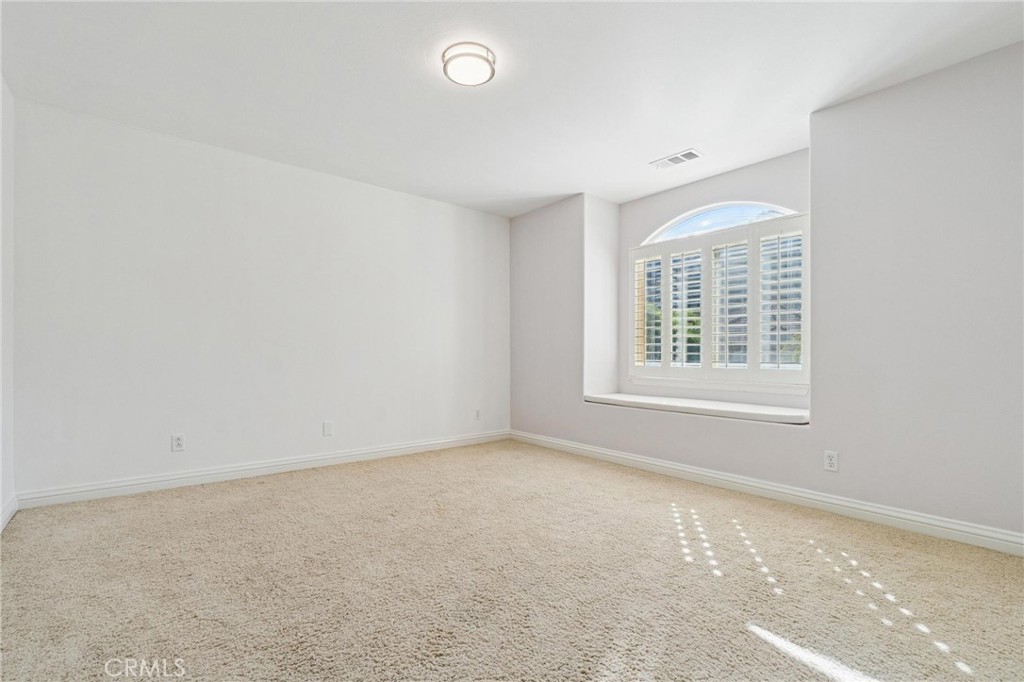 26511 Brooks Circle Stevenson Ranch, CA 91381 - Photo 36 of 65 an empty room with a window