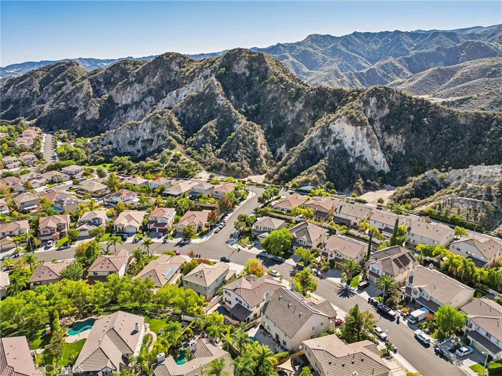 26511 Brooks Circle Stevenson Ranch, CA 91381 - Photo 53 of 65 a view of a tree in a field
