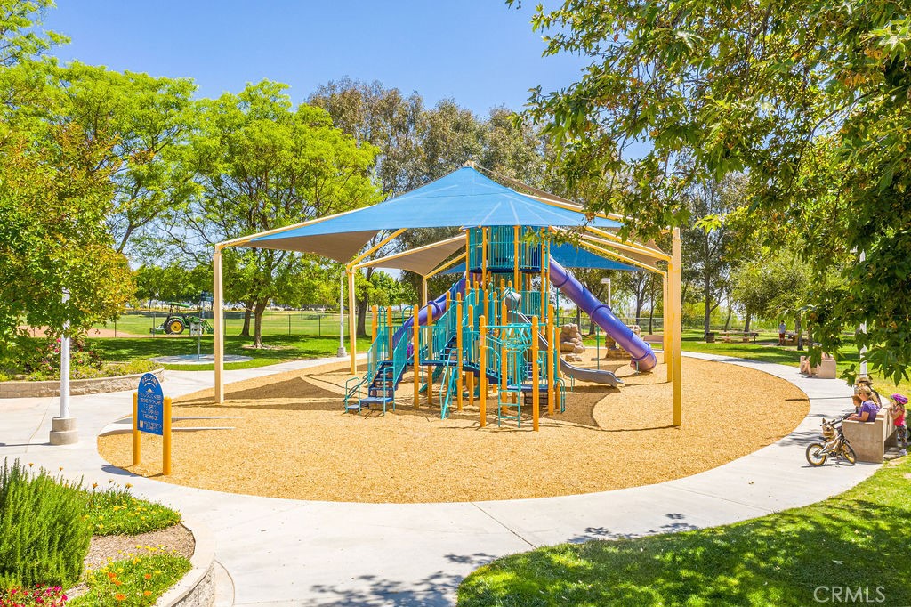 26511 Brooks Circle Stevenson Ranch, CA 91381 - Photo 58 of 65 a view of a swimming pool with a patio