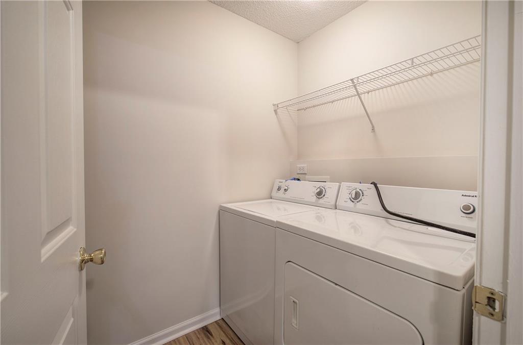 150 Old Mill Road, Unit 205 Cartersville, GA 30120 - Photo 13 of 32 a utility room with dryer and washer