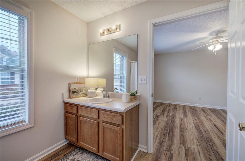 150 Old Mill Road, Unit 205 Cartersville, GA 30120 - Photo 20 of 32 a bathroom with a sink and a mirror