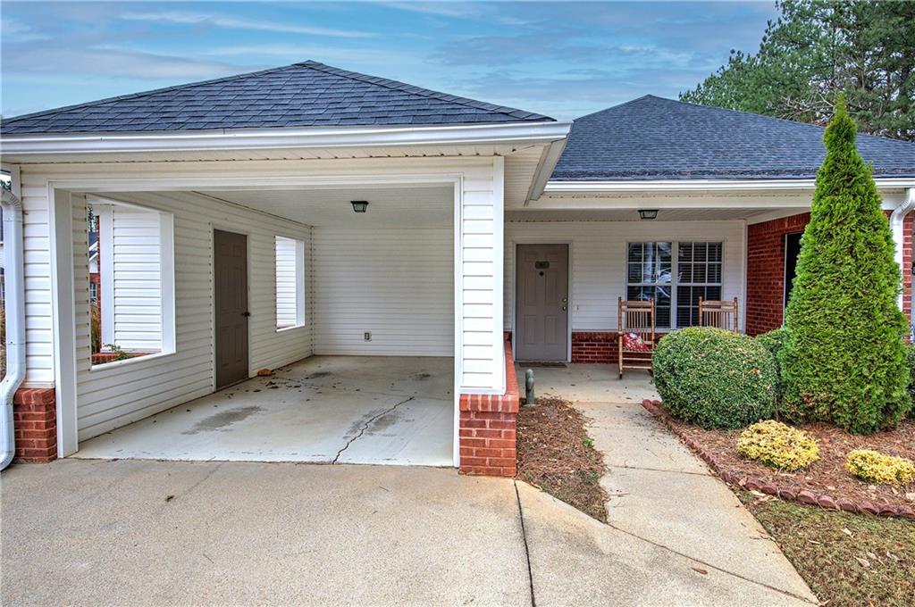 150 Old Mill Road, Unit 205 Cartersville, GA 30120 - Photo 27 of 32 front view of the house with a outdoor space