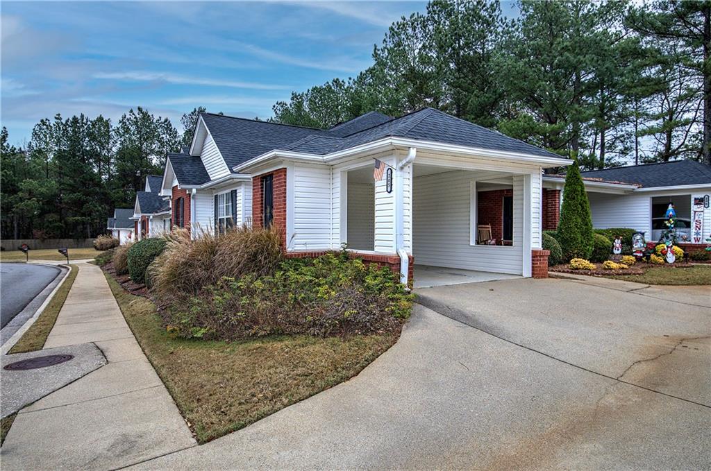 150 Old Mill Road, Unit 205 Cartersville, GA 30120 - Photo 28 of 32 front view of a house with a yard