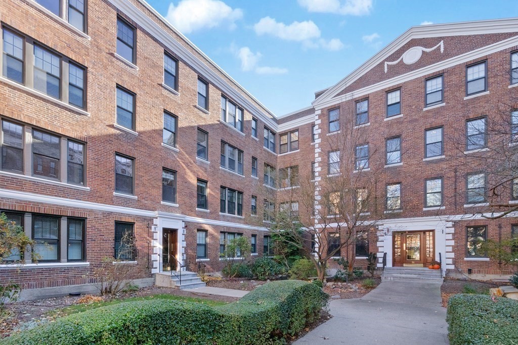 62 Queensberry Street, Unit 407 Boston, MA 02215 - Photo 13 of 14 a front view of a building with balcony and swimming pool