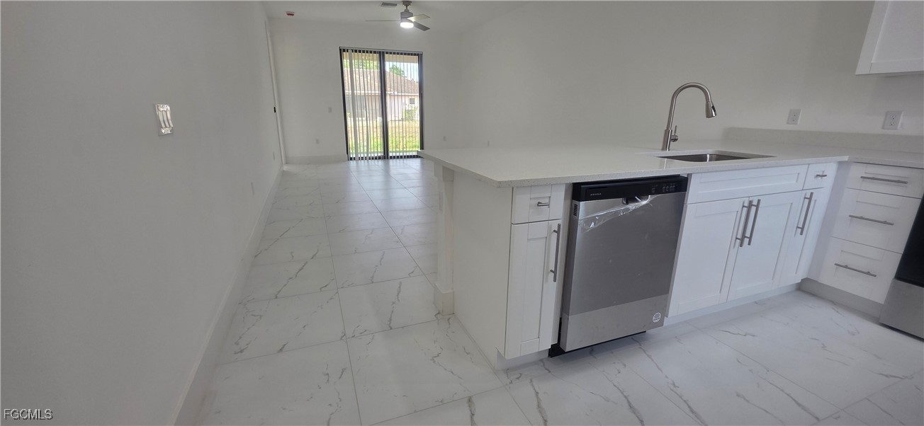 925 Chenault Street Lehigh Acres, FL 33974 - Photo 4 of 16 a view of an empty room with closet and a window