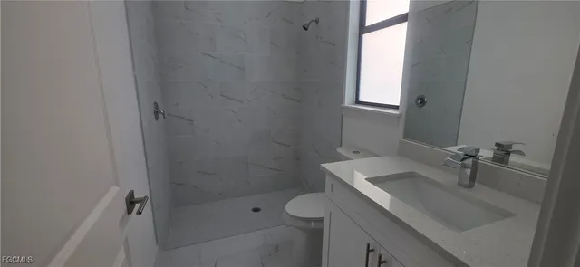 a view of room with a bathroom