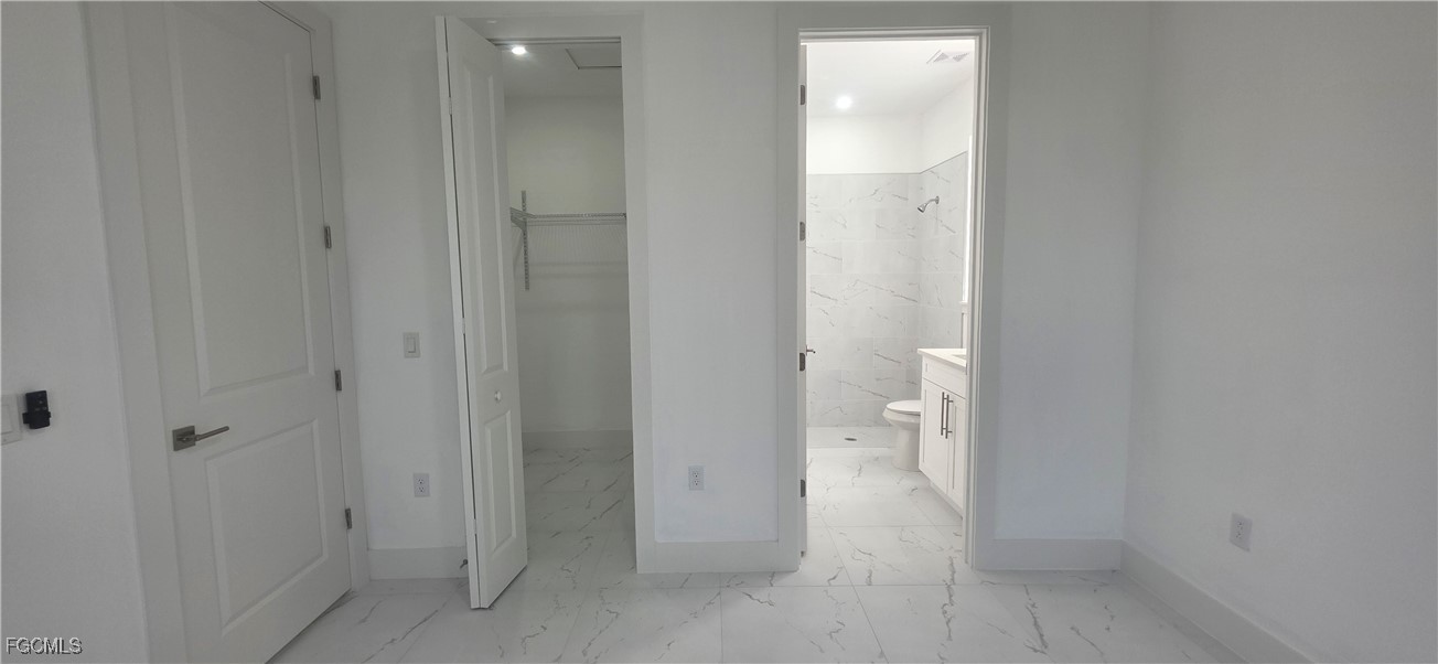 925 Chenault Street Lehigh Acres, FL 33974 - Photo 10 of 16 a view of room with a bathroom