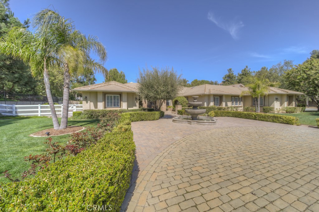 30370 Vía El Delora Temecula, CA 92592 - Photo 1 of 75 a view of a house with a yard