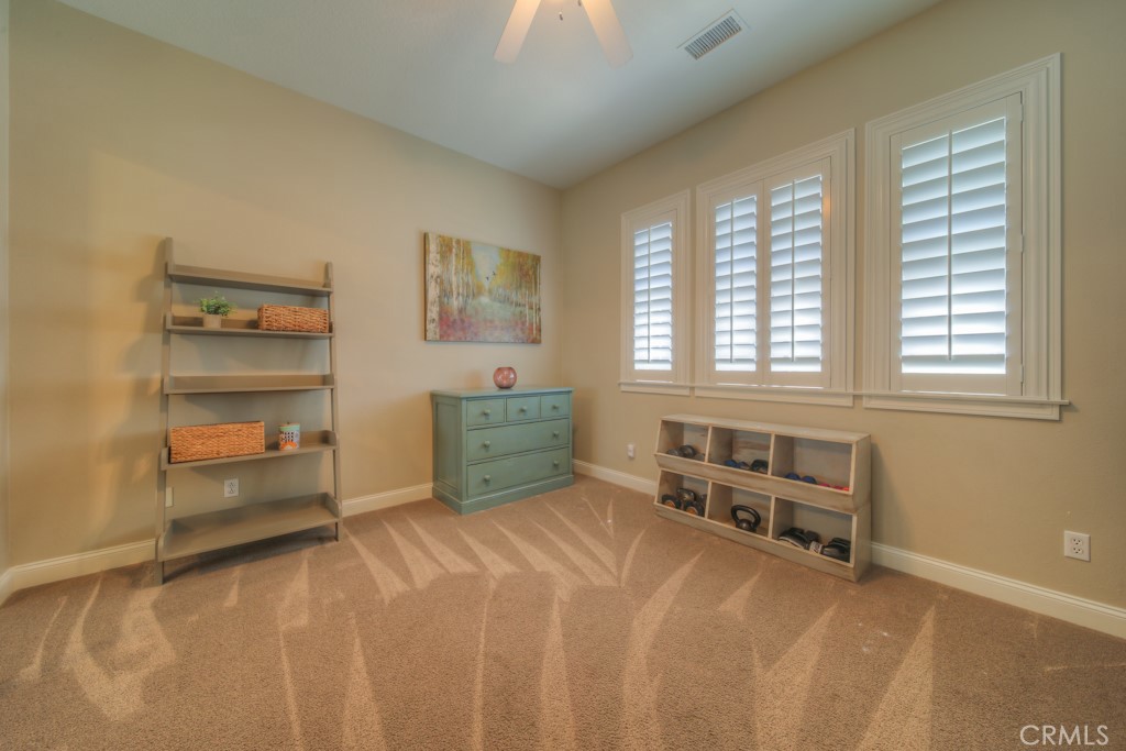 30370 Vía El Delora Temecula, CA 92592 - Photo 42 of 75 a room with a bed and a window