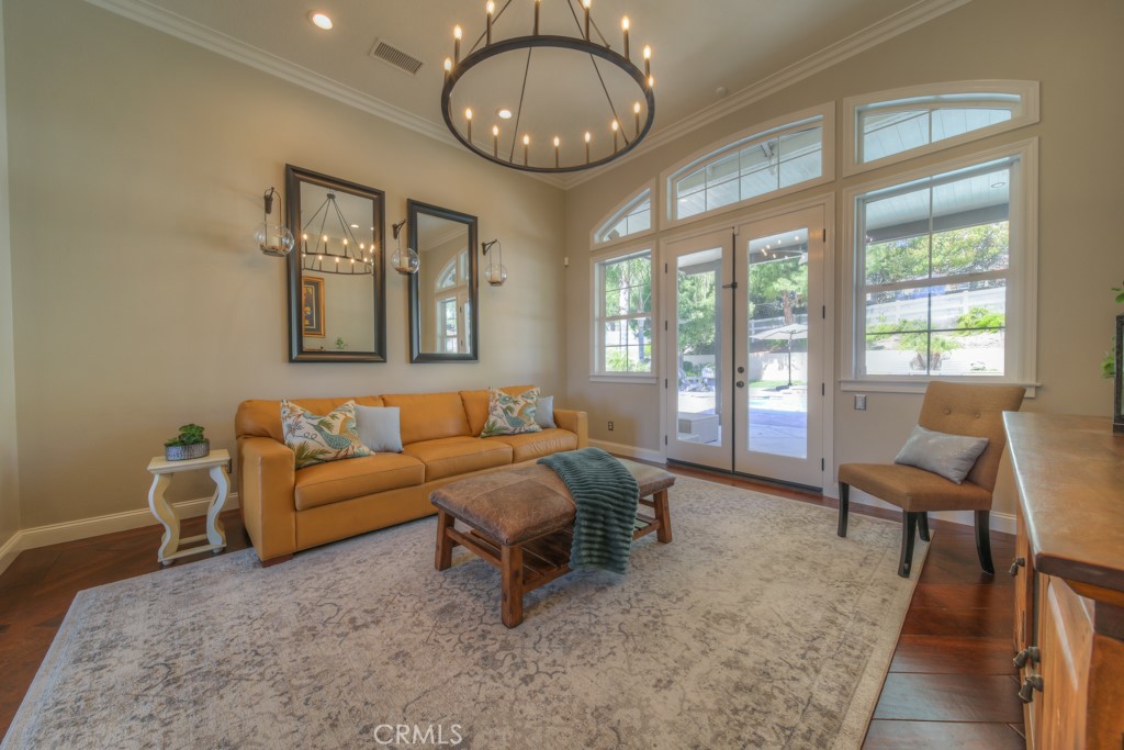 30370 Vía El Delora Temecula, CA 92592 - Photo 10 of 75 a living room with furniture and a large window