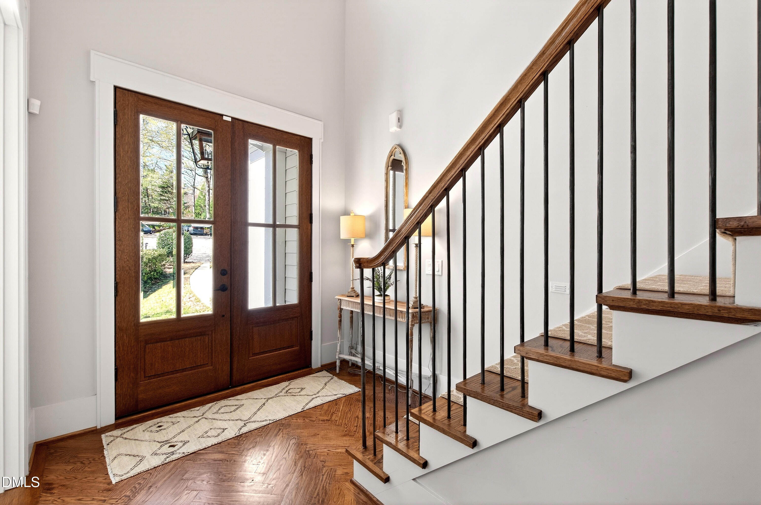 1116 Hymettus Court Raleigh, NC 27607 - Photo 7 of 69 a view of entryway with wooden floor and stairs