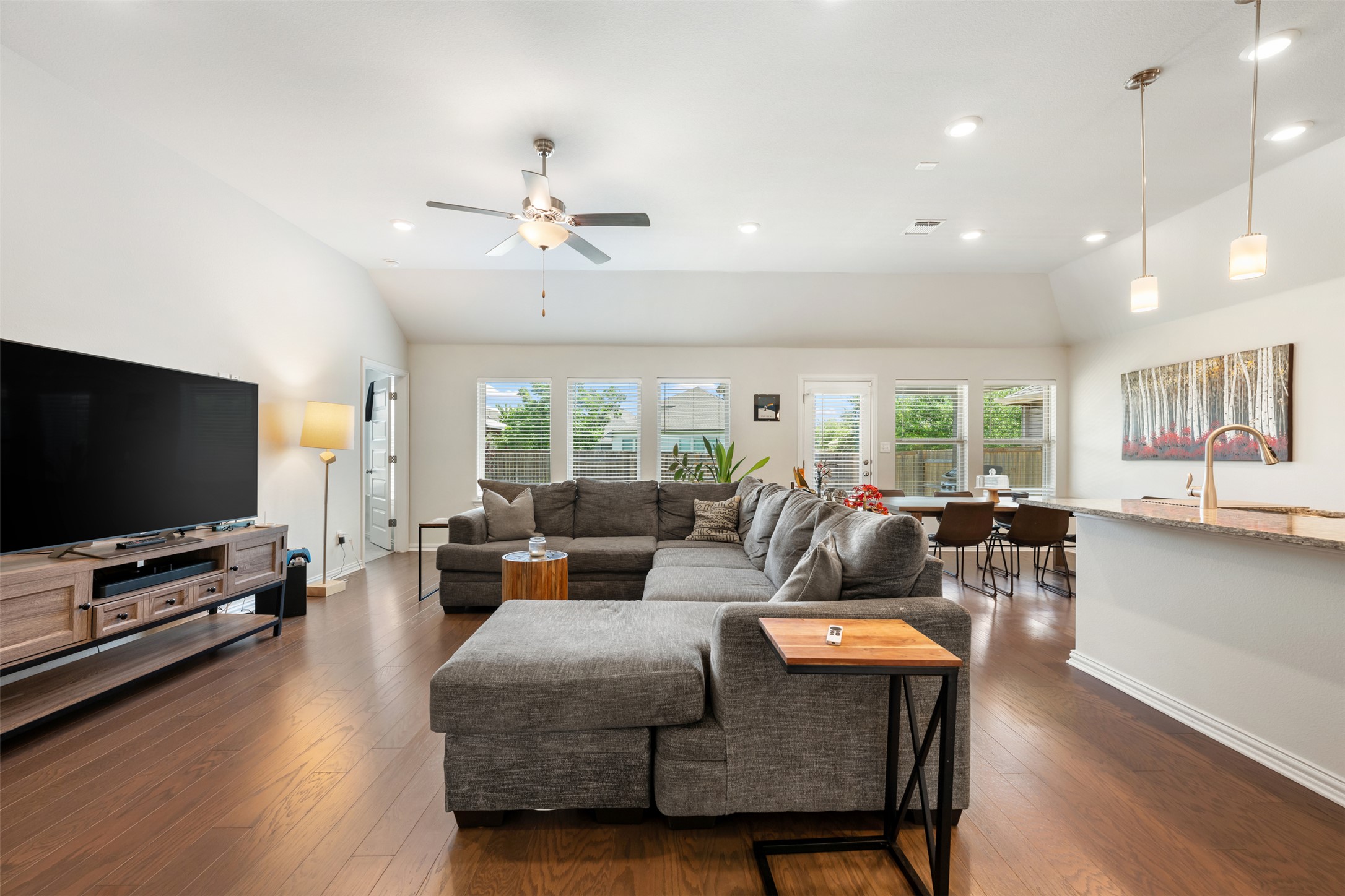 303 Cold Riv Run Kyle, TX 78640 - Photo 4 of 40 Lovely and durable engineered hardwood floors throughout the living areas.