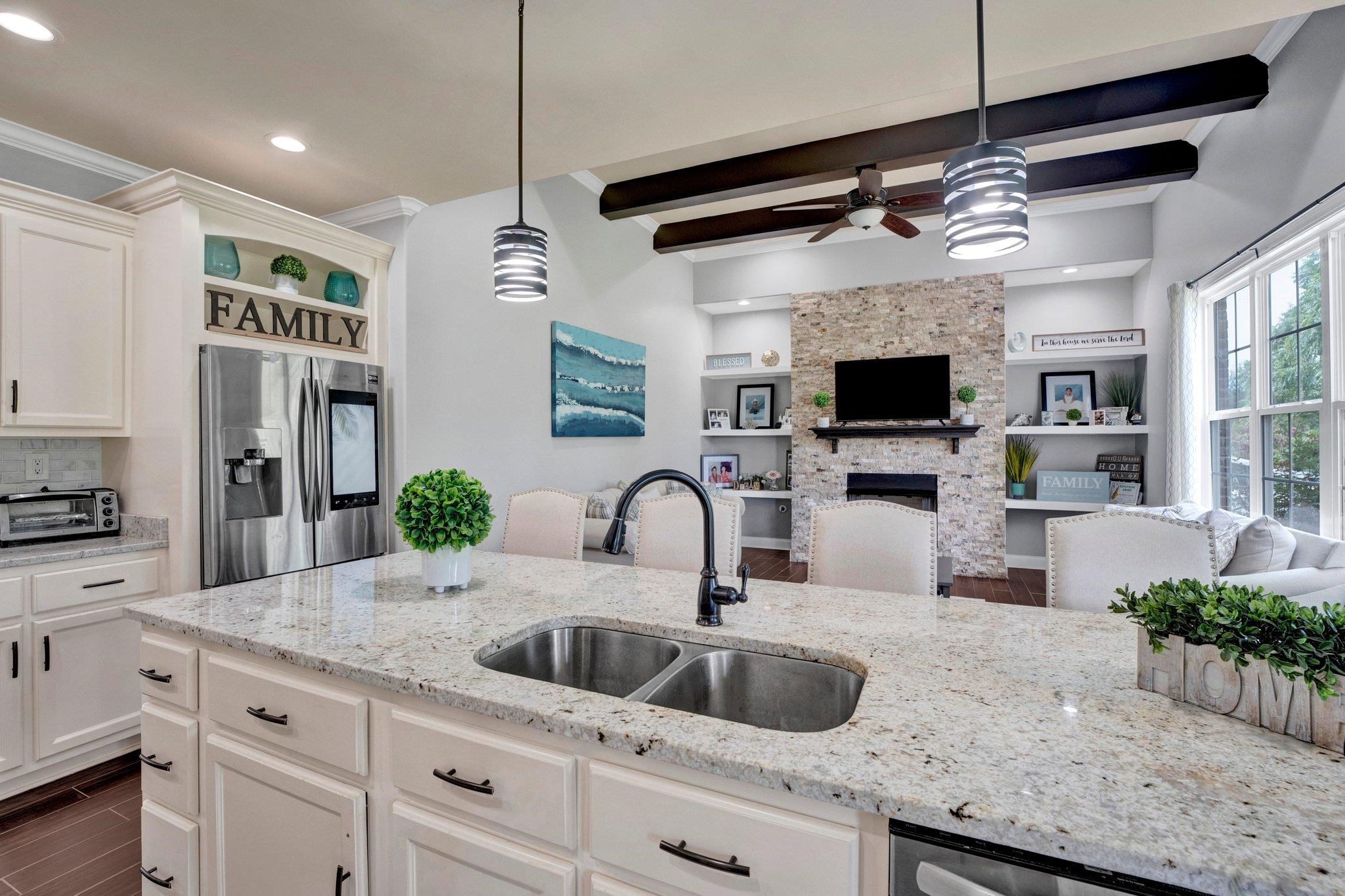 3270 Rast Road Millington, TN 38053 - Photo 13 of 40 a kitchen with granite countertop a sink stainless steel appliances and cabinets