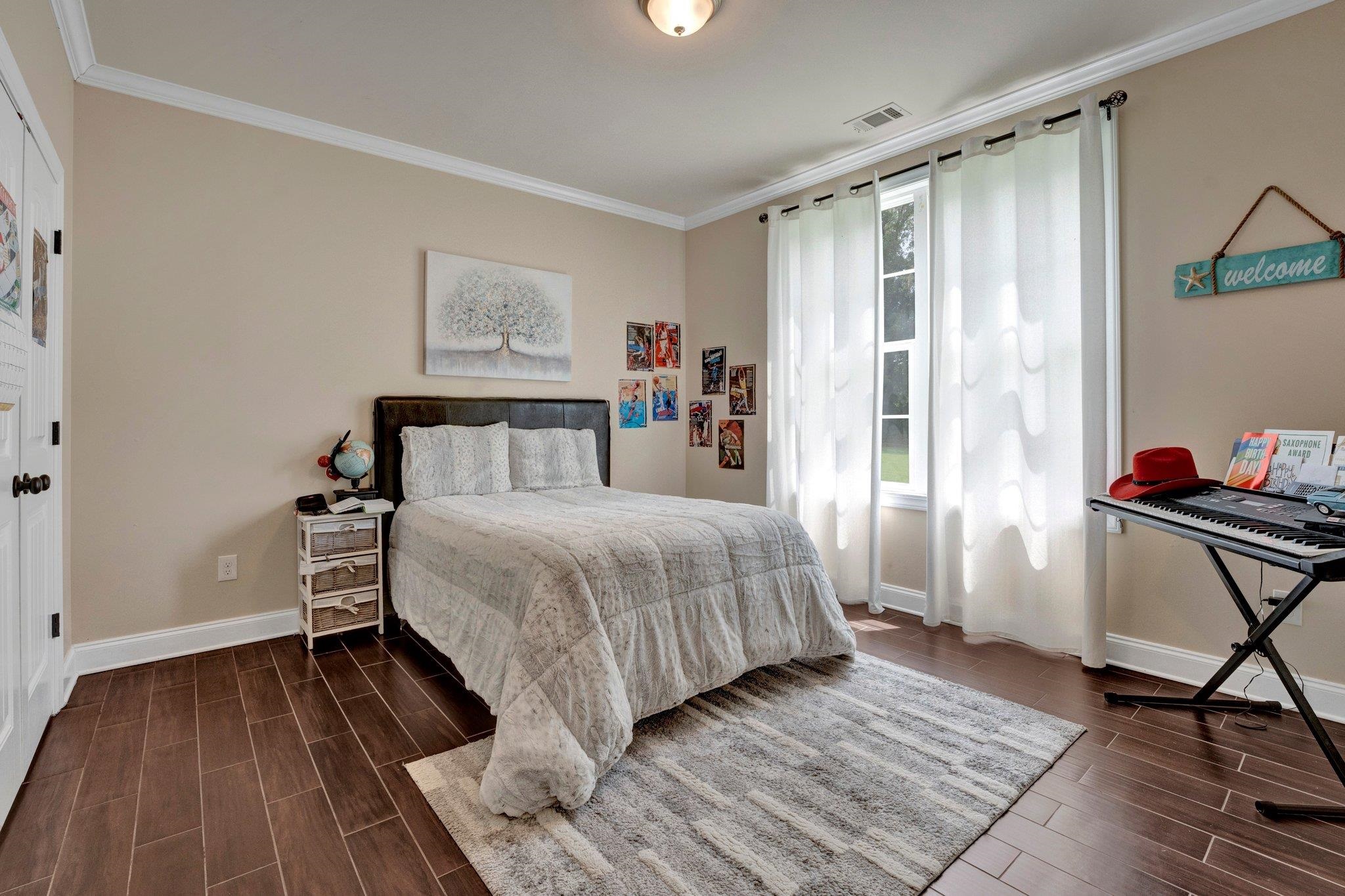 3270 Rast Road Millington, TN 38053 - Photo 21 of 40 a bedroom with a bed and a window