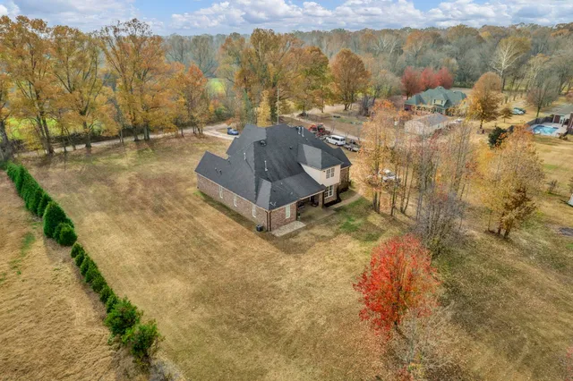 a view of a with large trees