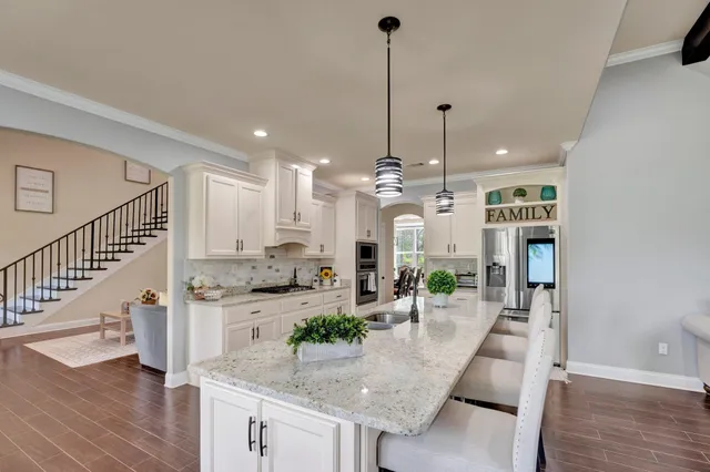 a view of living room with granite countertop furniture and fireplace