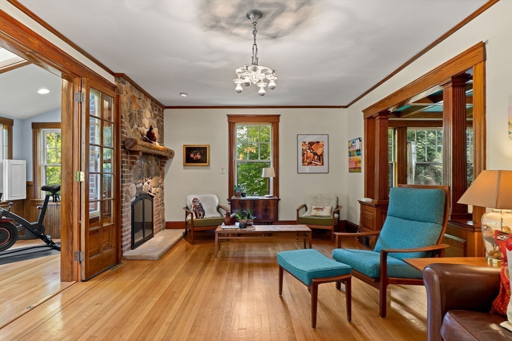 177 Highland Road Andover, MA 01810 - Photo 14 of 37 a living room with furniture and a chandelier