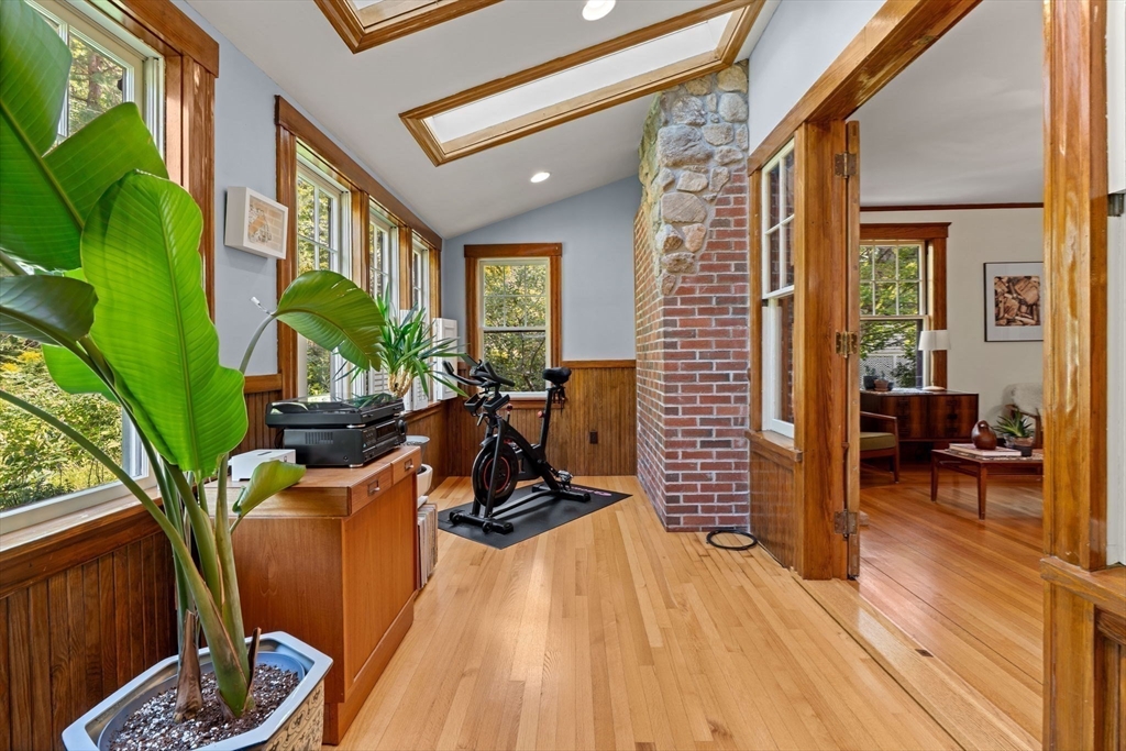 177 Highland Road Andover, MA 01810 - Photo 16 of 37 a view of a livingroom with furniture and a potted plant