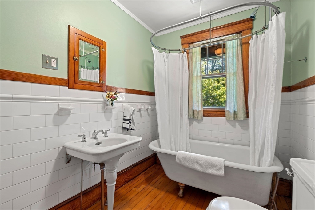 177 Highland Road Andover, MA 01810 - Photo 20 of 37 a bathroom with a sink and a mirror