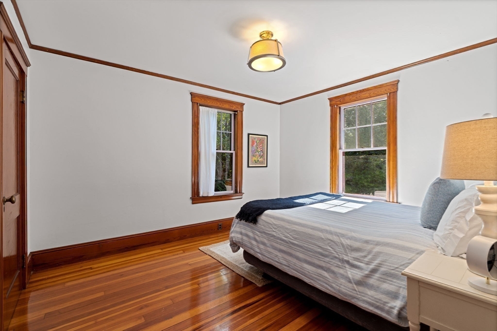 177 Highland Road Andover, MA 01810 - Photo 21 of 37 a bedroom with a bed and a window