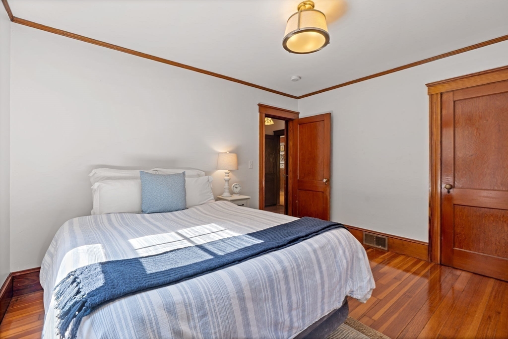177 Highland Road Andover, MA 01810 - Photo 22 of 37 a bedroom with a bed and a window